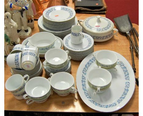 A Noritake 8-place setting tea and dinner service in the Royal Blue pattern
