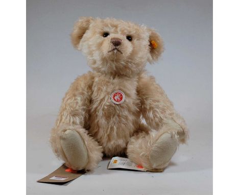 A Steiff blond mohair teddy-bear, with adjustable arms 