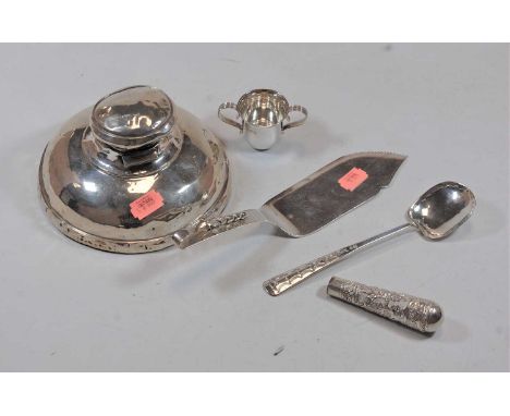 A large silver clad capstan inkwell on weighted base (condition very poor) together with a white metal spoon, miniature twin 