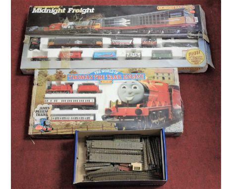 A Hornby Thomas the Tank Engine train set; together with a Hornby Railways Midnight Freight electric train set; and various t