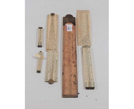 A collection of draughtsmans tools to include a box wood and brass mounted folding rule 