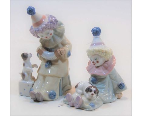 A Lladro porcelain figure of a young clown, h.15cm; together with one other similar (2)Condition report: Both in good conditi