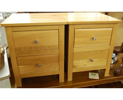 A pair of contemporary light oak two-drawer bedside chests, w.44cm