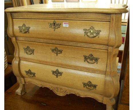 A Dutch light oak three drawer bombe chest, width 76cm