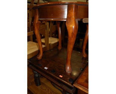 An oak bench, together with an Eastern hardwood and metal bound low square section occasional table and a further circular oc