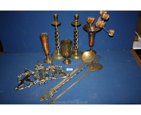 A quantity of brass including three Indian vases, toasting fork, spoons, pair of twisted stem candlesticks and brass plaque d