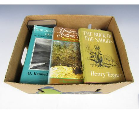 A quantity of books on the topic of deer hunting and management 