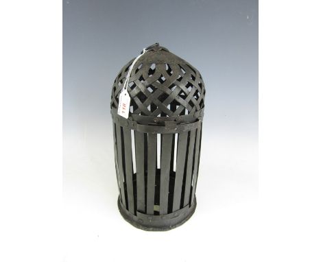 A wrought iron candle lantern
