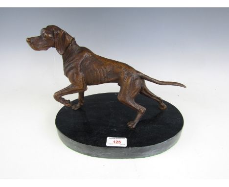 A 20th Century bronze sculpture of a pointer dog signed Nico, on marble platform base