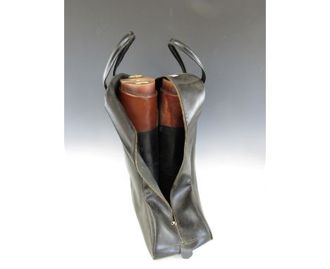 A pair of early 20th Century riding boots with 'Greenstreet Military and Hunting Bootmakers of Dover' wooden keepers, and a b