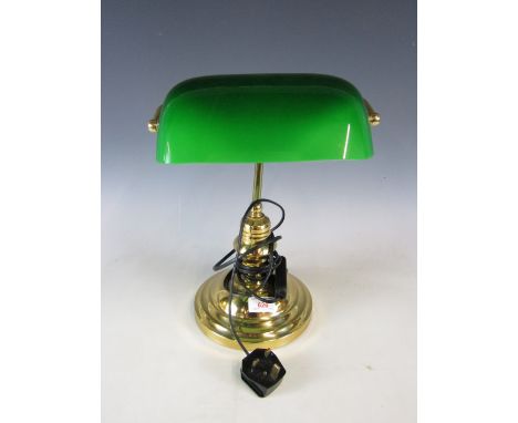 A brass effect desk lamp