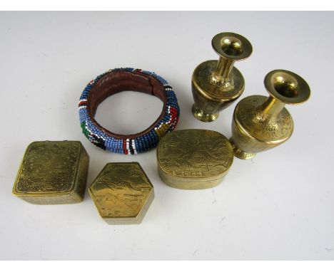 Miniature oriental brassware including a stamp box and two diminutive vases, together with a beaded African bangle 