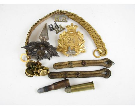 Sundry military artifacts including a silver helmet spike