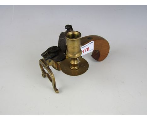 A reproduction flintlock tinder lighter