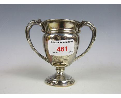 A silver trophy cup 