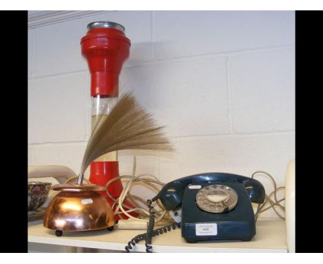 A lava lamp and optical light lamp, together with a vintage telephone  
