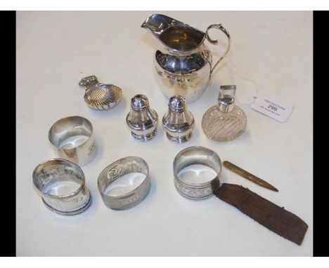 A silver cream jug, caddy spoon, etc. 