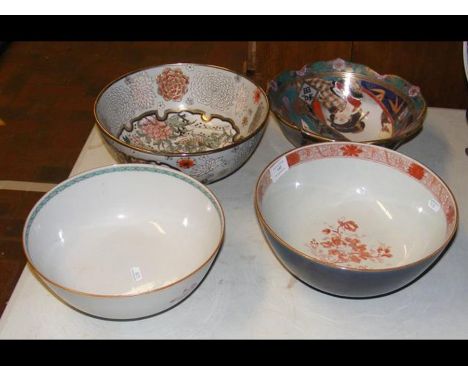 An oriental ceramic bowl, together with three others CONDITION REPORTBy our judgement, condition of lot is fair.Notably, ther