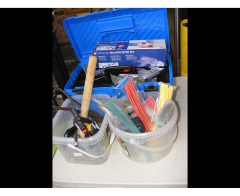 A blue tool box full of useful tools, including electric stapler, together with two plastic tubs of tools