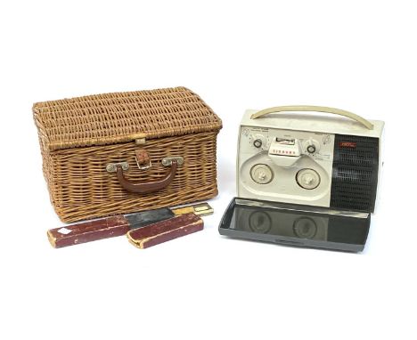 A Grundig reel-to-reel, wicker hamper and a slide rule 