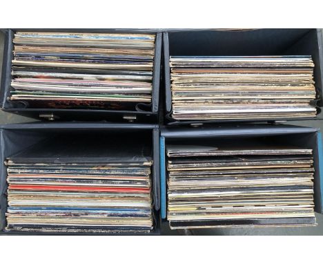 Four boxes of mostly classic rock LPs, to include the Beatles, Rolling Stones, Stones, Led Zeppelin, Bob Dylan, David Bowie, 