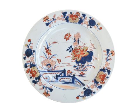 A large Chinese Imari charger, Kangxi, painted to the interior with lotus pond scene, 35cm diameter 