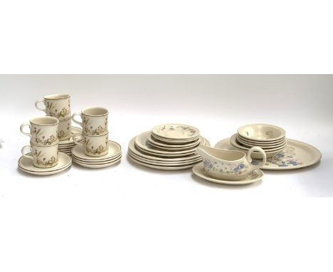 A quantity of Poole 'Springtime' dinnerwares (20 pieces), together with M&amp;S 'Harvest' pattern mugs and saucers 