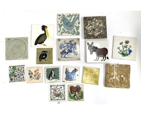 A quantity of tiles to include Boch Freres la Louviere Delft style tile, Minton penguin tile, Hereford tiles, Portuguese tile