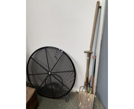 A black painted metal garden table 100cmD, together with a small quantity of garden tools 