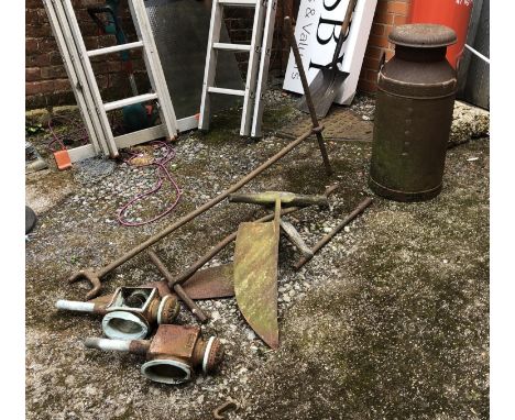 A vintage United Dairies Wholesale ltd milk churn; together with two carriage lanterns and tools 