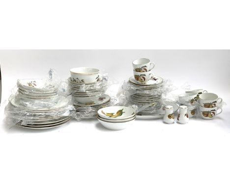 A Royal Worcester 'Evesham' part dinner service to include teacups, bowls, side plates, dinner plates, salt and pepper, etc, 