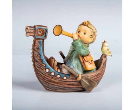 Hand painted porcelain figure. Young boy in a rowboat holding an instrument. Exclusive Edition 2008/2009. M.I. Hummel Club. G