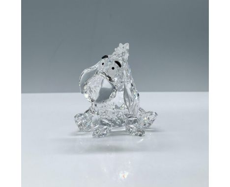 Clear faceted crystal figure of the classic Disney donkey sitting looking glum. Part of the Winnie the Pooh collection. Swaro