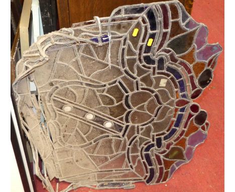 A lead light, unframed and with damage to extremities, approx 80 x 75cm 