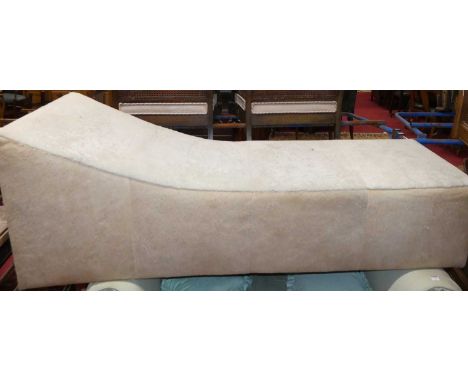 A contemporary wool and cow hide upholstered day bed of wedge shape, length 205cmWhite part of the bed has some light stainin