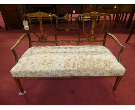 An Edwardian rosewood and floral satinwood inlaid two-seater salon settee, having pale pink floral needlework upholstered stu