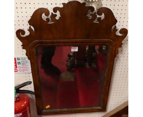A 19th century fret-carved walnut Chippendale style wall mirror, 67.5 x 51.5cm 
