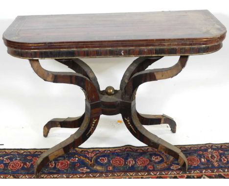 A Regency zebra wood? rosewood crossbanded and further brass inlaid D-end fold over card table, having a baize lined interior