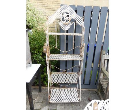 A painted wired and interlaced metal four-tier folding garden plant stand, w.70cm