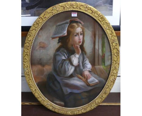 Circa 1900 French school - three-quarter length portrait of a young scholar, pastel, framed as an oval, 63 x 51cm
