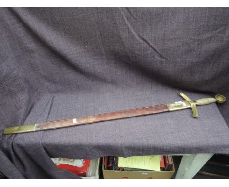 A copy English, two handed broadsword with brass guard and pommel wired handle, 91cm blade, leather and metal scabbard