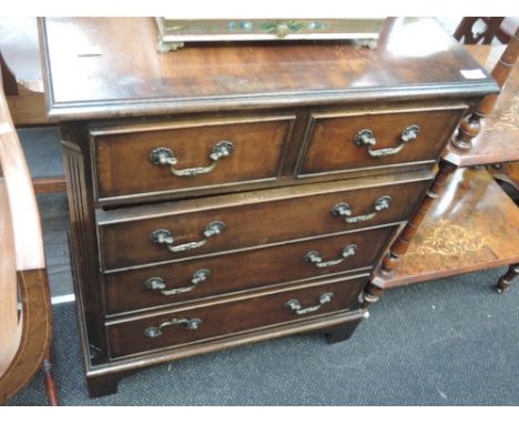 A late 20th century mahogany period style chest of 2 short and 3 long drawers on bracket feet