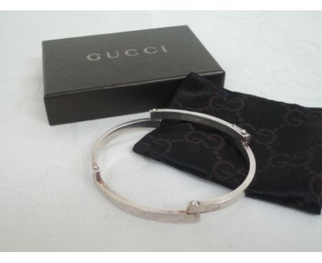 An Italian silver four bar articulated bangle by Gucci, with original box 