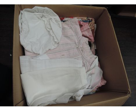 Two multi coloured patch work bed covers, a gents vintage waistcoat, a pink flannelette night shirt, three aprons and two mop