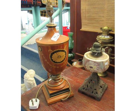 Classical design wooden urn shaped lamp base, together with an early 20th century single oil burner on cast metal base.(B.P. 