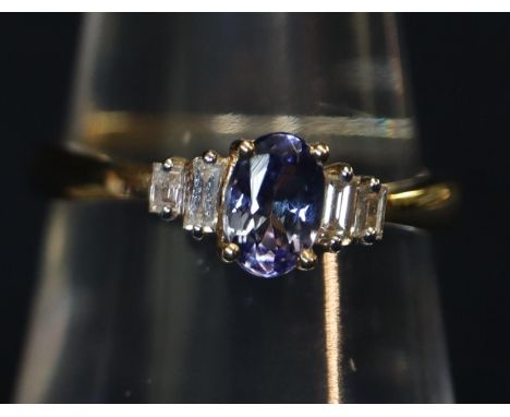 Diamond set 14ct gold tanzanite dress ring. 2.3g approximately. Ring size M. (B.P. 21% + VAT)&nbsp;Condition is good, Import 