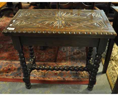 Late Victorian carved oak folding card table on bobbin turned supports. (B.P. 21% + VAT)Top is completely detached from base.