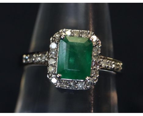 9ct white gold emerald and diamond dress ring. 2.1g approx, ring size M & 1/2.(B.P. 21% + VAT) 