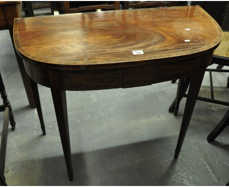 19th Century mahogany inlaid and cross banded fold over card table standing on square tapering legs. (B.P. 21% + VAT) 