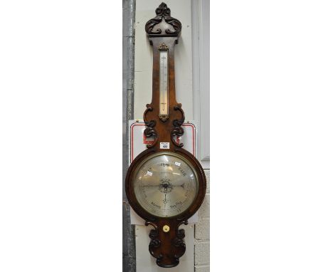 19th Century walnut carved banjo barometer marked Dan Robinson Bradford. (B.P. 21% + VAT)Currently not working